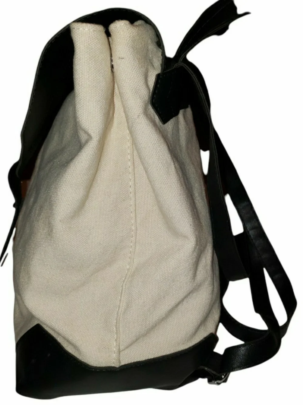 Deux Lux canvas demi backpack with a distinctive structured black vegan leather.